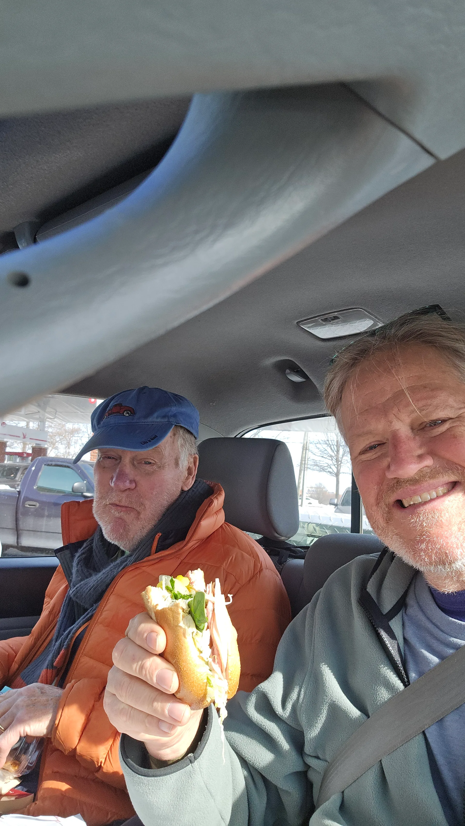 Dad and Ben with a hoagie