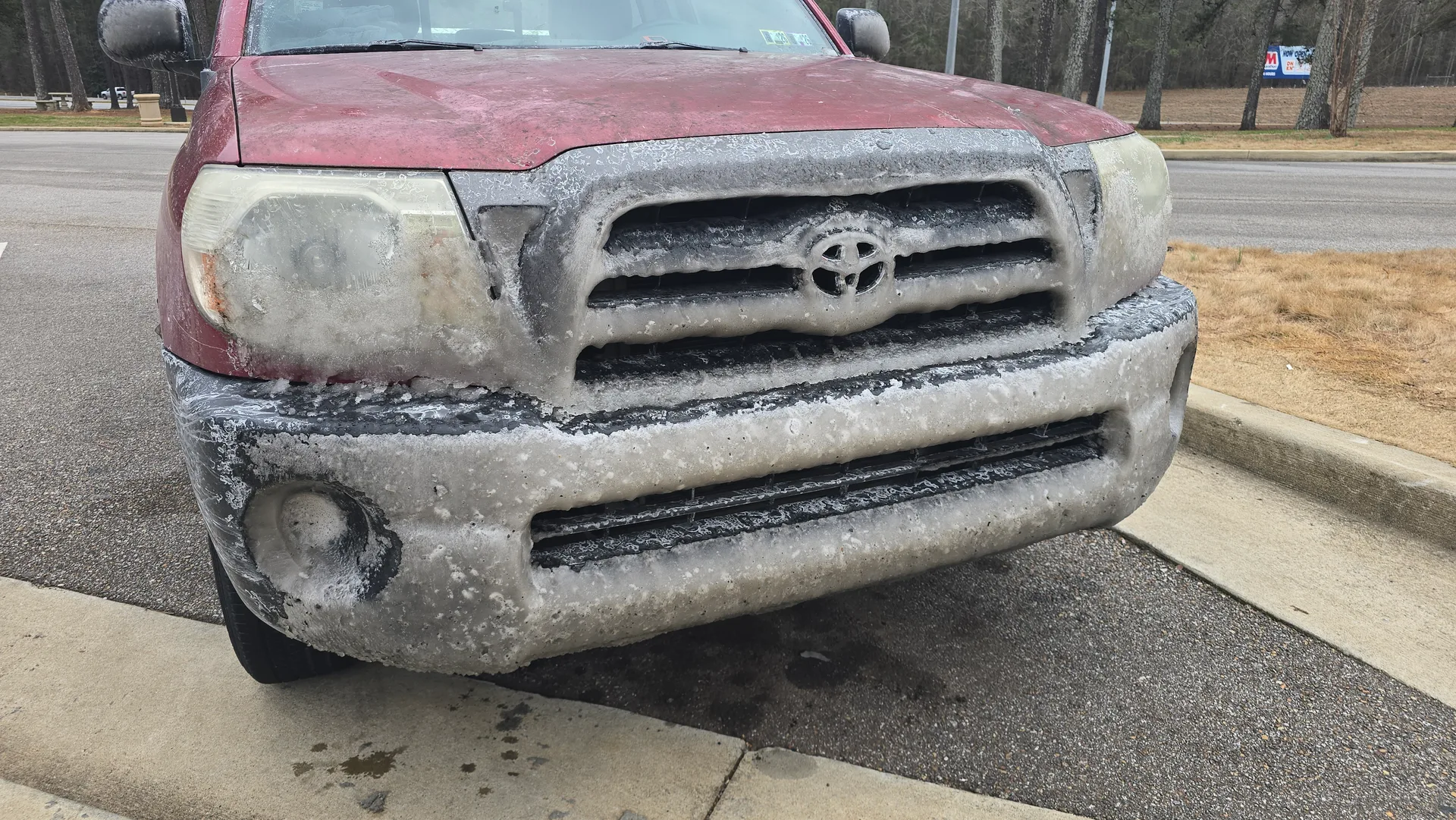 Ice caked on the truck grill