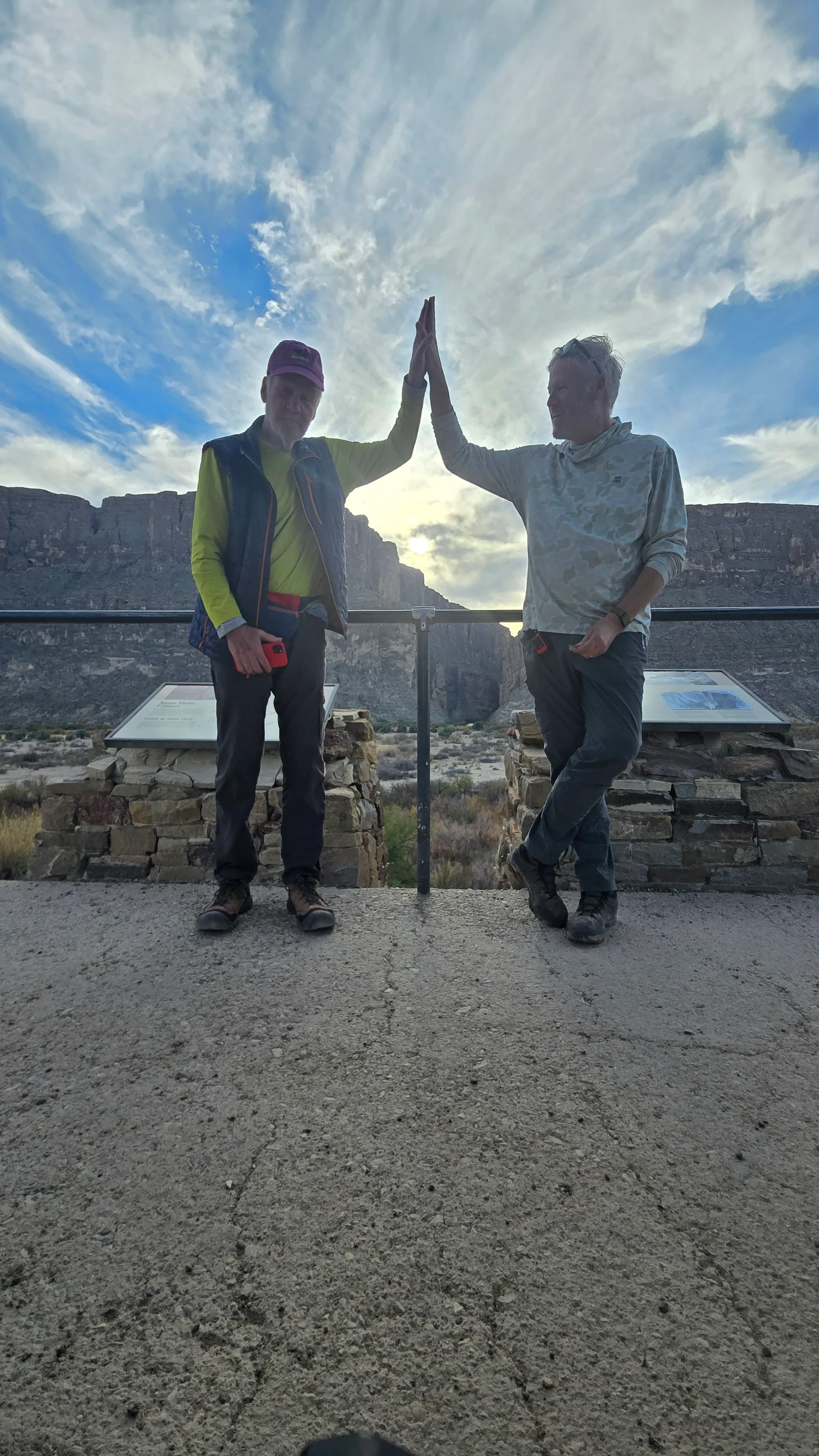 Ben and Dad high five at the canyon